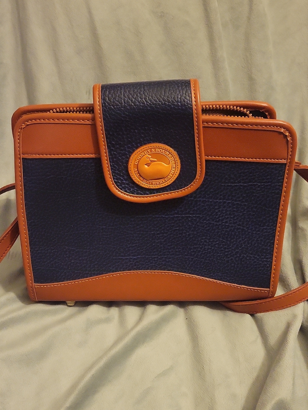 Dooney & Bourke Navy and Tan Pebbled Leather Crossbody